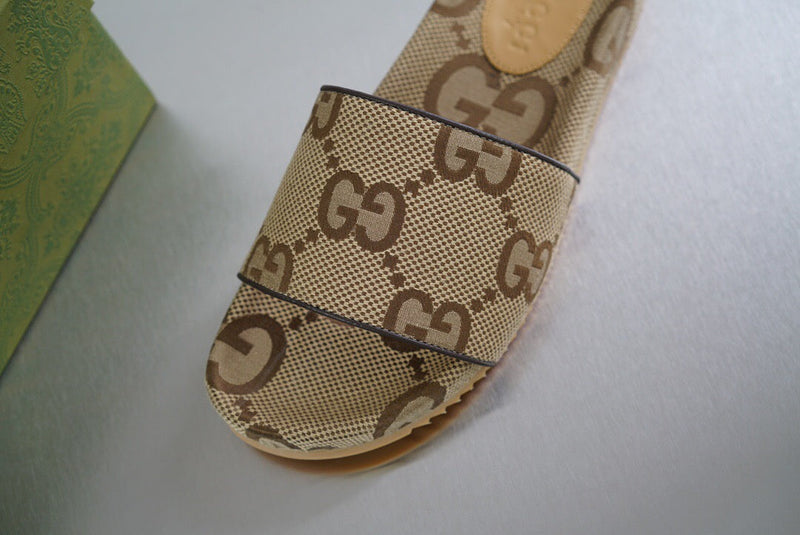 Gucci maxi GG canvas slide sandal