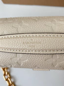 Pochette Métis East West Monogram Empreinte Cream