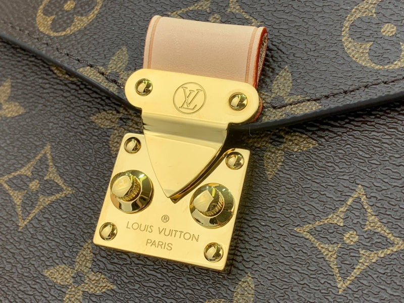 Pochette Métis East West Monogram Canvas Brown